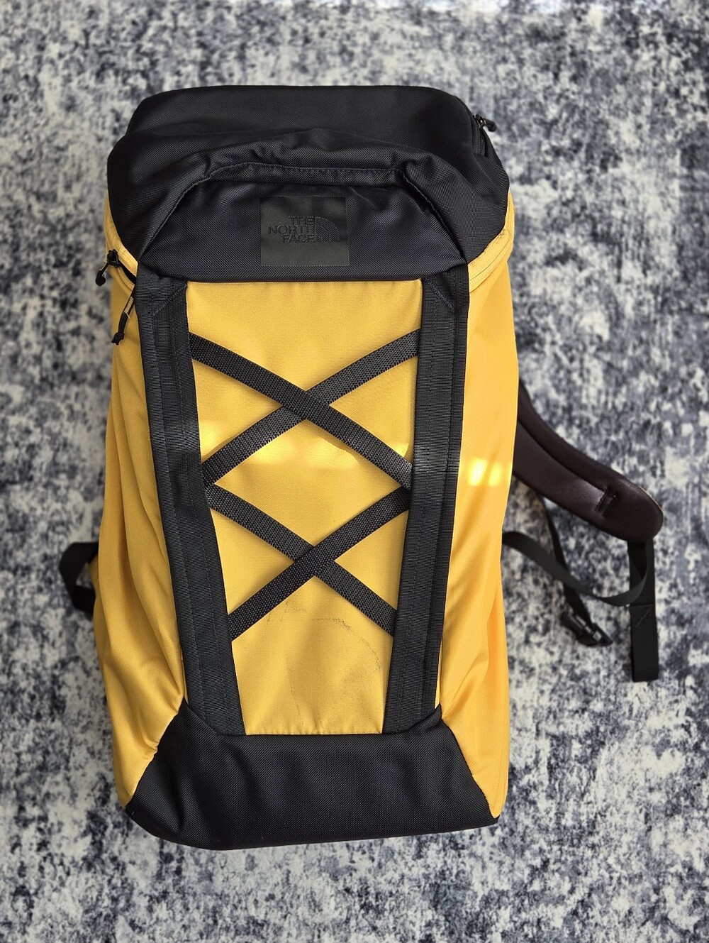 The North Face Yellow and Black Backpack